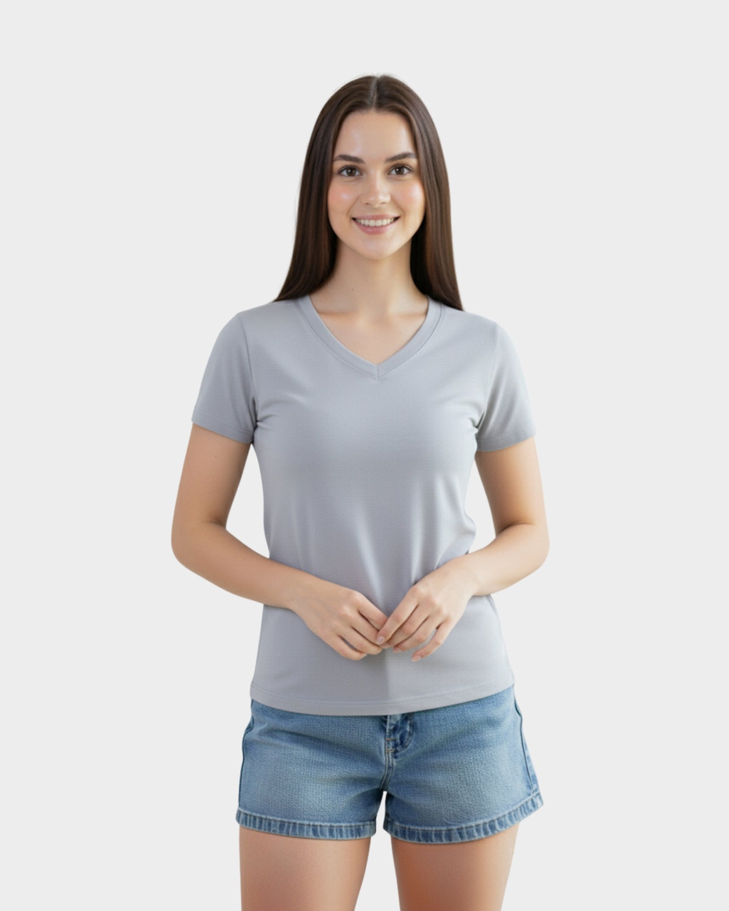Vista frontal polo cuello v mujer color plomo algodón que estiliza